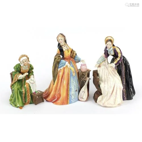 Three Royal Doulton figurines of Henry VIII wives comprising...