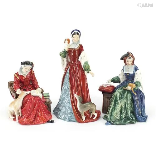 Three Royal Doulton figurines of Henry VIII wives comprising...