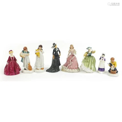 Eight collectable china figurines including Royal Doulton Bu...