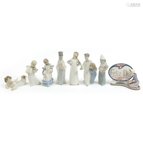 Eight Lladro figures and figurines including a Feliz Dia pla...