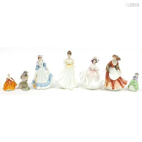 Six Royal Doulton figurines and a Royal Copenhagen bird incl...