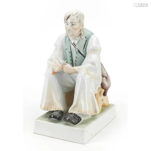 Zsolnay Pecs, Hungarian porcelain seated gentleman, 32cm hig...