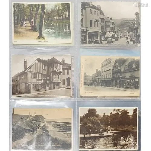 Early 20th century and later postcards arranged in an album ...