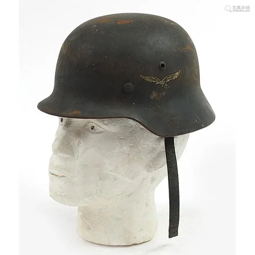 German military interest tin helmet with leather liner and d...