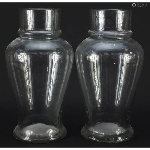 Pair of 19th century apothecary baluster glass vases, each 3...