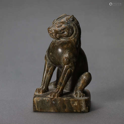 CHINESE TANG DYNASTY BLUESTONE CARVED LION, 7TH CENTURY