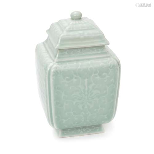 A SQUARE CELADON SLIP PATTERN LIDDED JAR