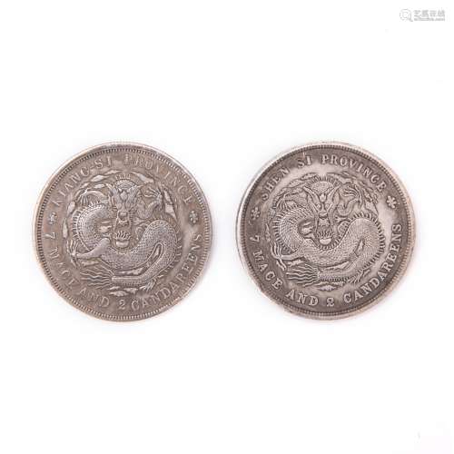 TWO CHINESE SILVER COINS