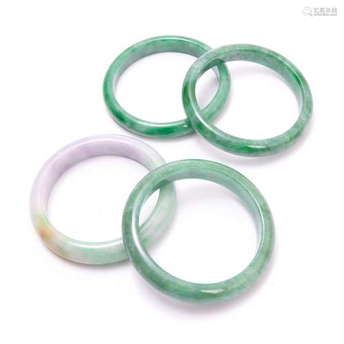 GROUP OF FOUR JADE BANGLES