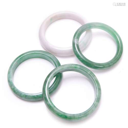 GROUP OF FOUR JADE BANGLES