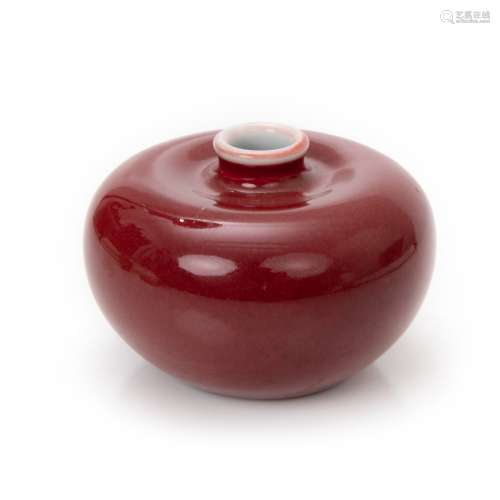 A SMALL CHINESE RED-GLAZED APPLE ZUN