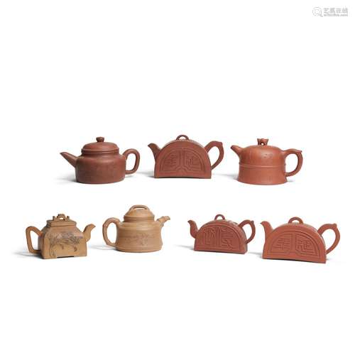 A GROUP OF SEVEN YIXING TEAPOTS AND COVERS 19th / 20th centu...