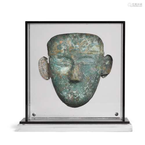 A SILVERED- AND GILT-COPPER-ALLOY FUNERARY MASK Liao dynasty