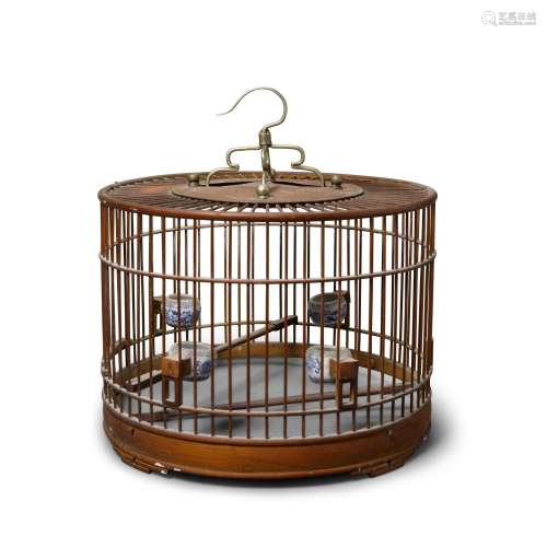 A BAMBOO BIRD CAGE WITH BLUE AND WHITE BIRD FEEDERS Late Qin...