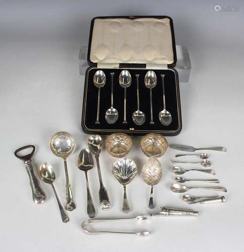 A small group of silver items, including a set of six coffee...