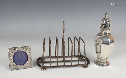 A late Victorian silver six-division toast rack with ring ha...