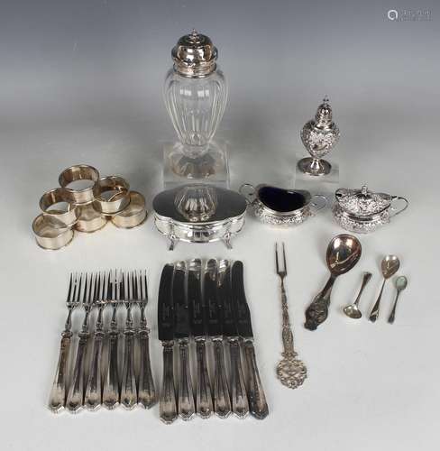 An Edwardian silver three-piece condiment set of oval shape,...