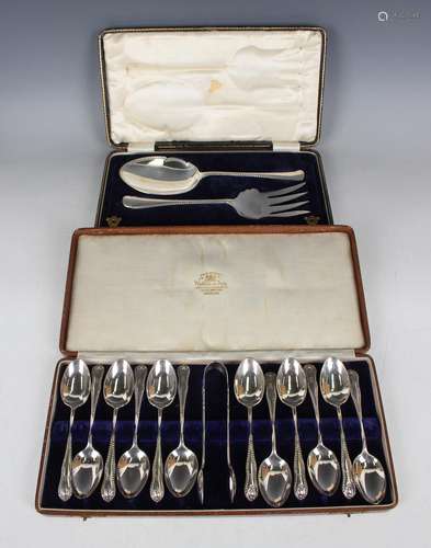 A George V silver dessert serving fork and spoon with engrav...