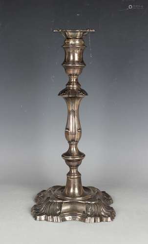 An Edwardian silver candlestick of baluster form with styliz...