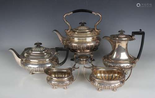 A silver harlequin five-piece tea set, each of cushion form ...