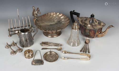 A group of plated items, including a tazza of scallop shell ...