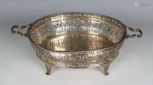 A George V silver oval two-handled bowl, the gadrooned rim a...