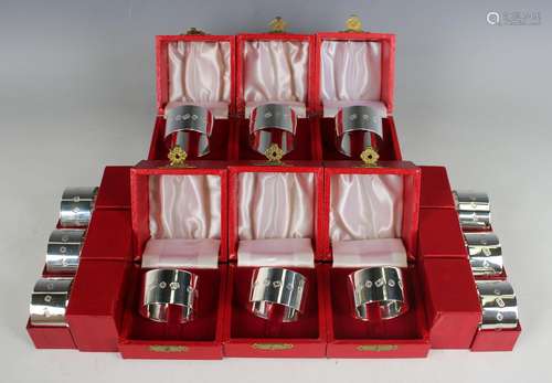 A set of twelve Elizabeth II silver napkin rings, Sheffield ...