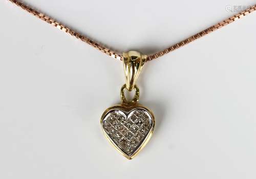 An 18ct gold and diamond heart shaped pendant, pave set with...