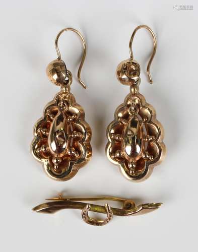 A pair of Victorian gold pendant earrings, each of shaped dr...