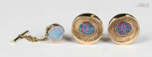 A pair of gold and opal doublet oval cufflinks with folding ...