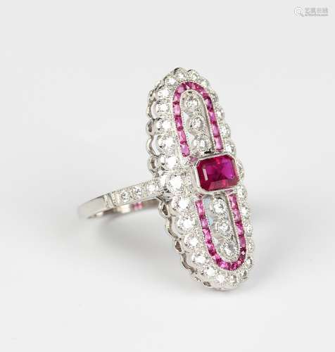 A platinum, treated ruby and diamond oval panel ring, collet...