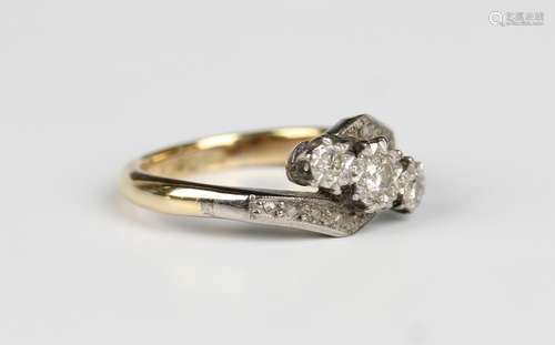 A gold, platinum and diamond three stone ring, mounted with ...