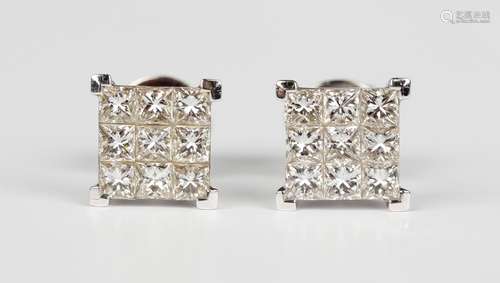 A pair of 18ct white gold and diamond cluster earstuds, each...