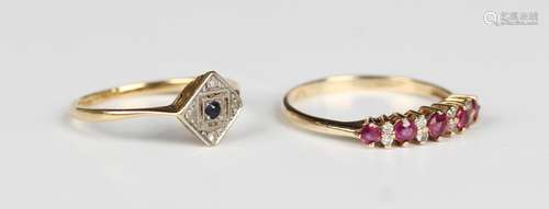 A 9ct gold, ruby and diamond ring, mounted with a row of fiv...