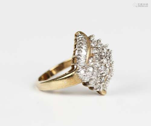 A 9ct gold and diamond cluster ring, mounted with circular a...