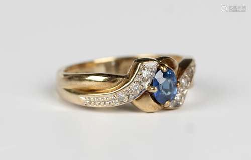 A 9ct gold, sapphire and diamond ring in a twist design, cla...