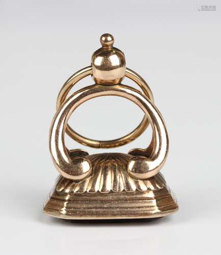 A gold and citrine pendant fob seal, early 19th century, eng...