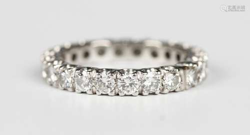 A diamond full eternity ring, mounted with circular cut diam...