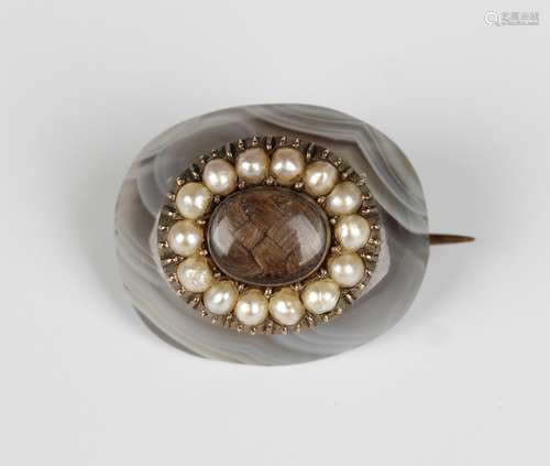 A late 18th century seed pearl and banded agate oval brooch,...