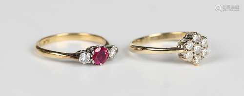 A gold, platinum, ruby and diamond three stone ring, claw se...