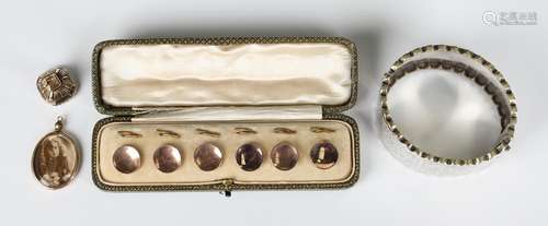 A set of six gold mounted circular buttons with dished front...