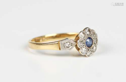 A gold, platinum, sapphire and diamond nine stone cluster ri...