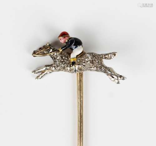 An Edwardian gold, rose cut diamond and enamelled stickpin i...