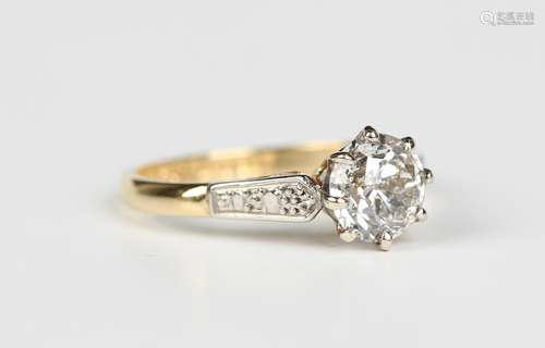 A gold, platinum and diamond solitaire ring, claw set with t...