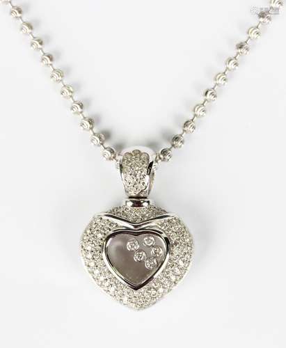 A white gold and diamond heart shaped pendant, glazed to the...