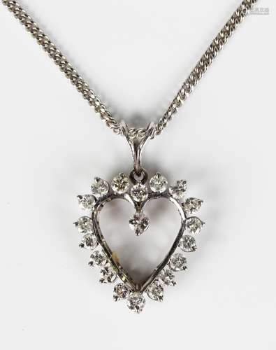 A diamond pendant in an open heart shaped design, claw set w...