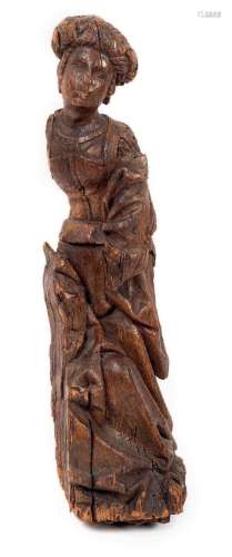 Sainte Femme au turban.En chêne sculpté, fragment d'un g...