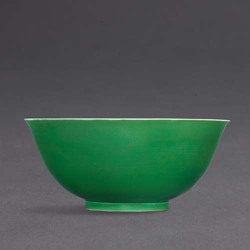 An extremely rare large apple-green glazed bowl Seal mark an...