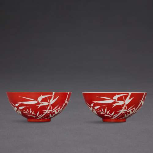 A fine and rare pair of coral-ground reserve-decorated ‘bamb...