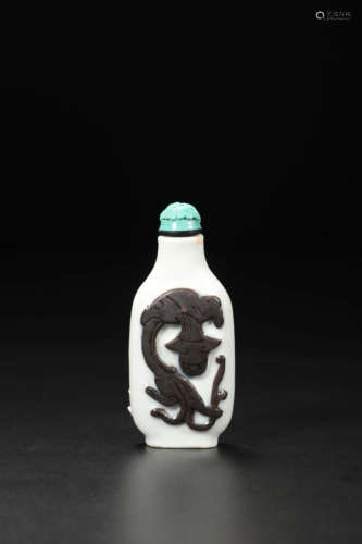 Carved Porcelain Kui-Dragon Snuff Bottle